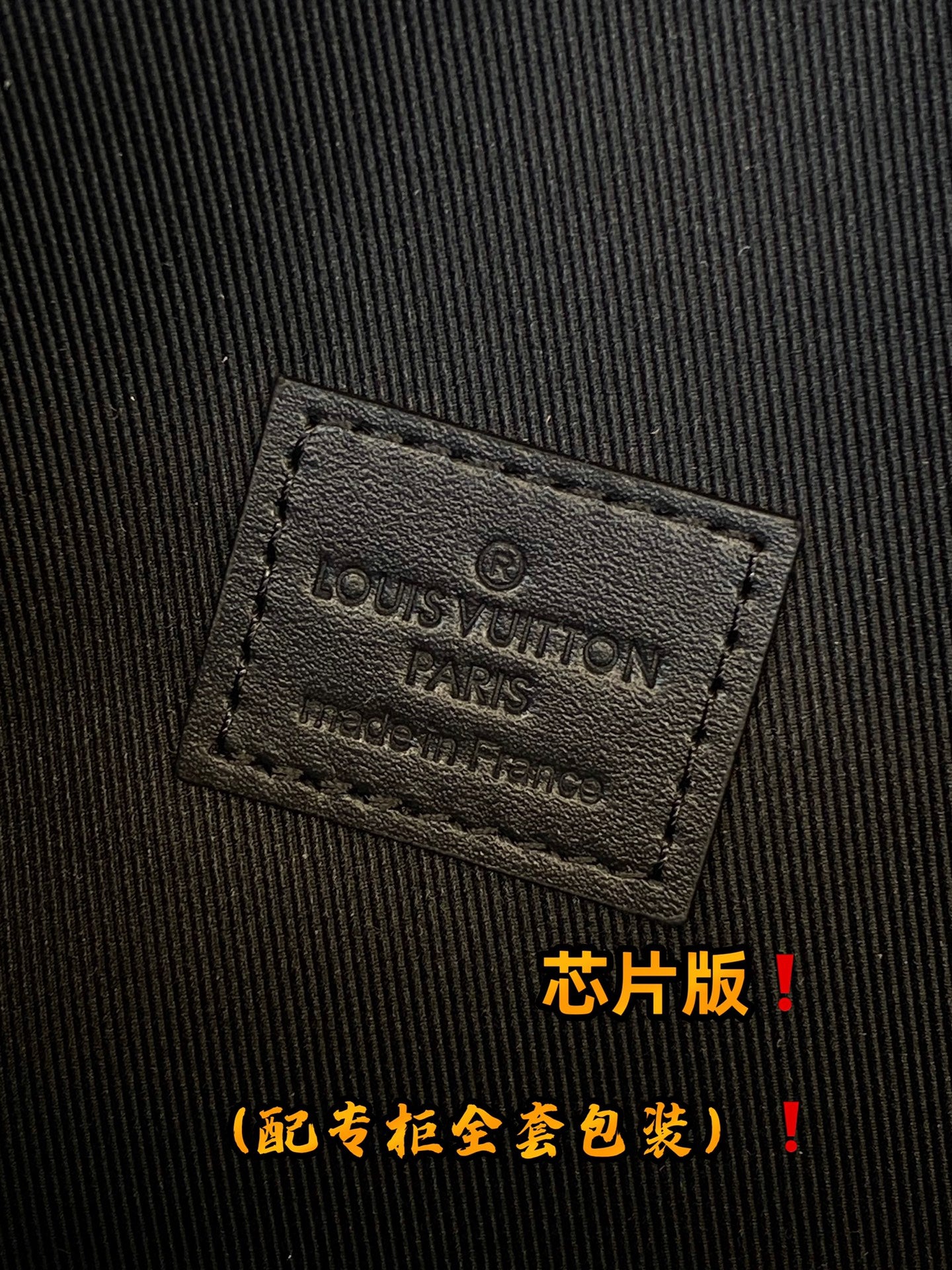 Louis Vuitton leather label patch on monogram crossbody bag
