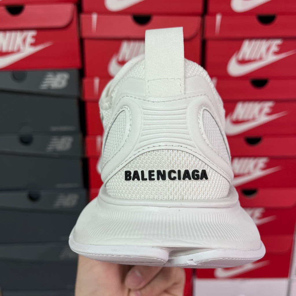 White Balenciaga sneaker heel with BALENCIAGA text on the back