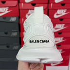 White Balenciaga sneaker heel with BALENCIAGA text on the back