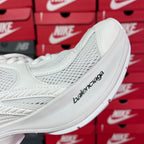 White Balenciaga sneaker side with logo print and ribbed sole edge