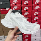 White Balenciaga unisex sneakers with mesh uppers and lace-up front