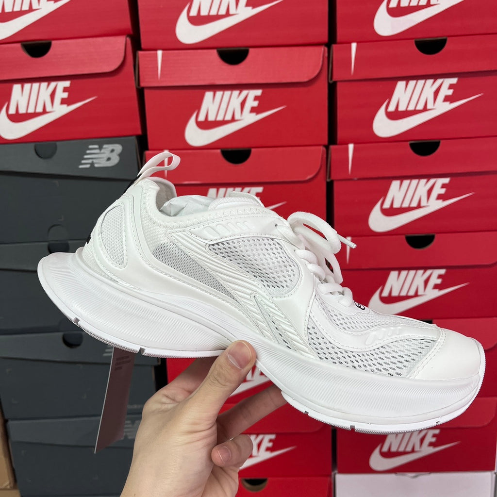 White Balenciaga unisex sneakers with mesh upper and low-profile sole