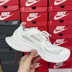 White Balenciaga unisex sneakers with mesh upper and low-profile sole