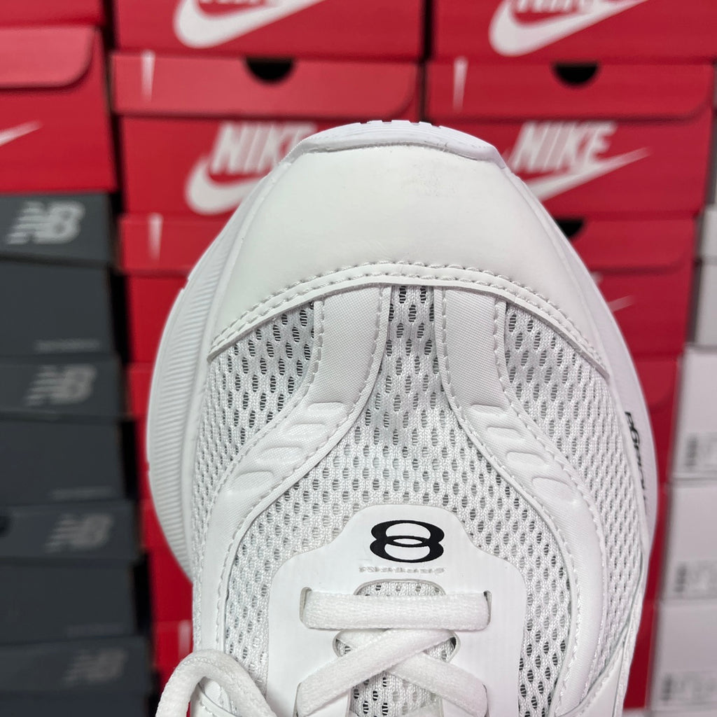 White Balenciaga sneaker toe with mesh paneling and lace eyelets