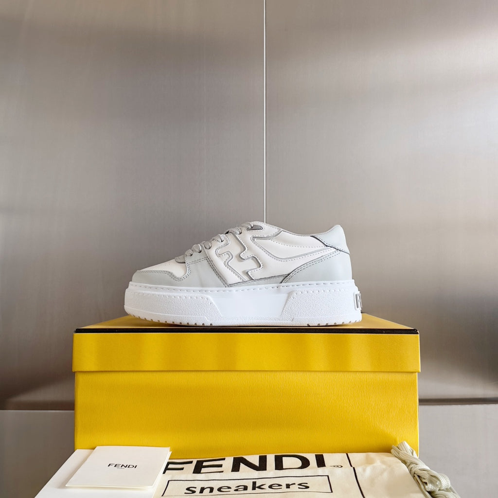 White Fendi unisex low-top sneaker, lace-up closure with logo patch on tongue.