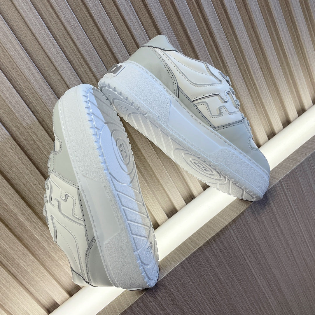 Fendi unisex sneakers, side view in white leather with contrasting logo detailing