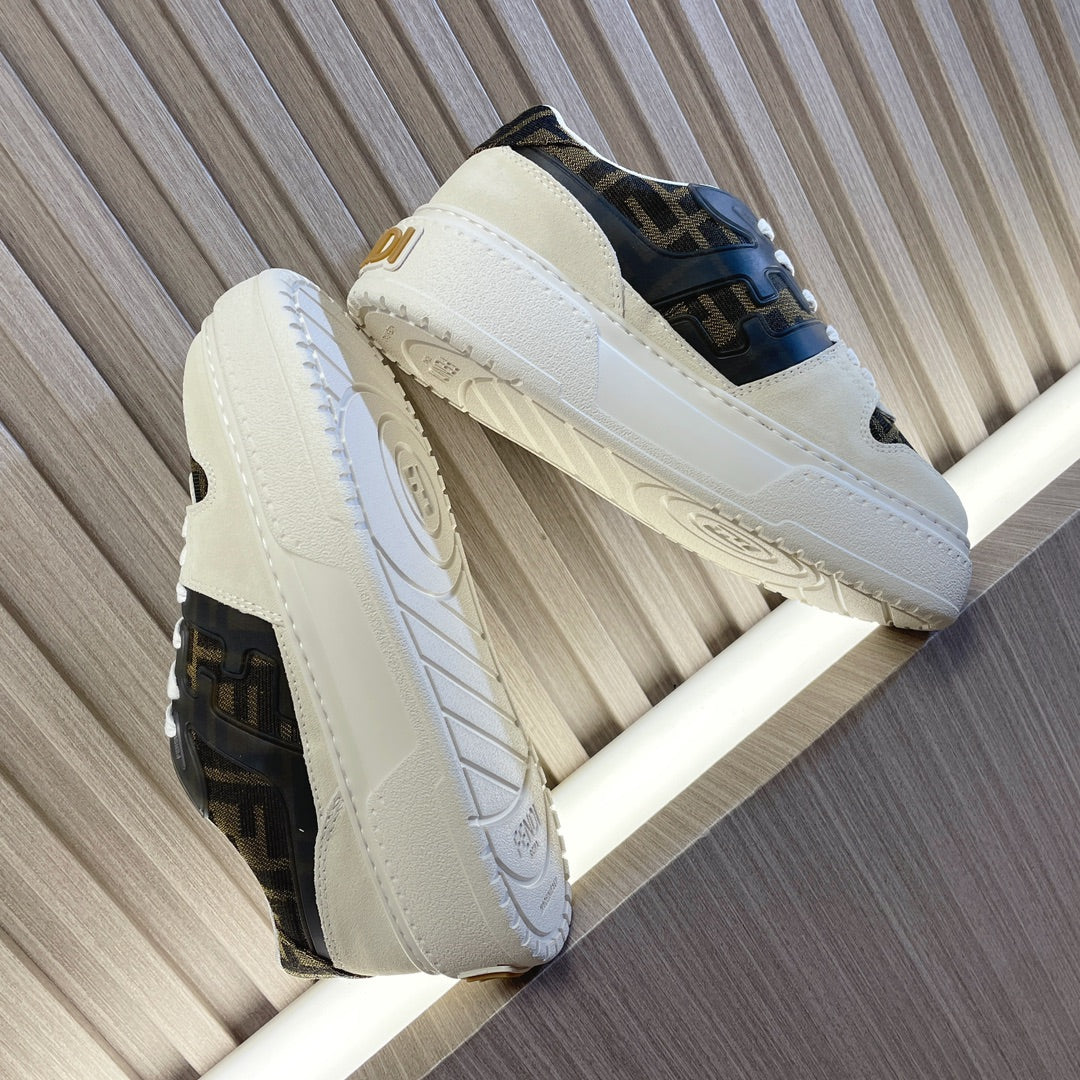 Low-top sneakers side view with white uppers, dark logo panels, and thick white sole.