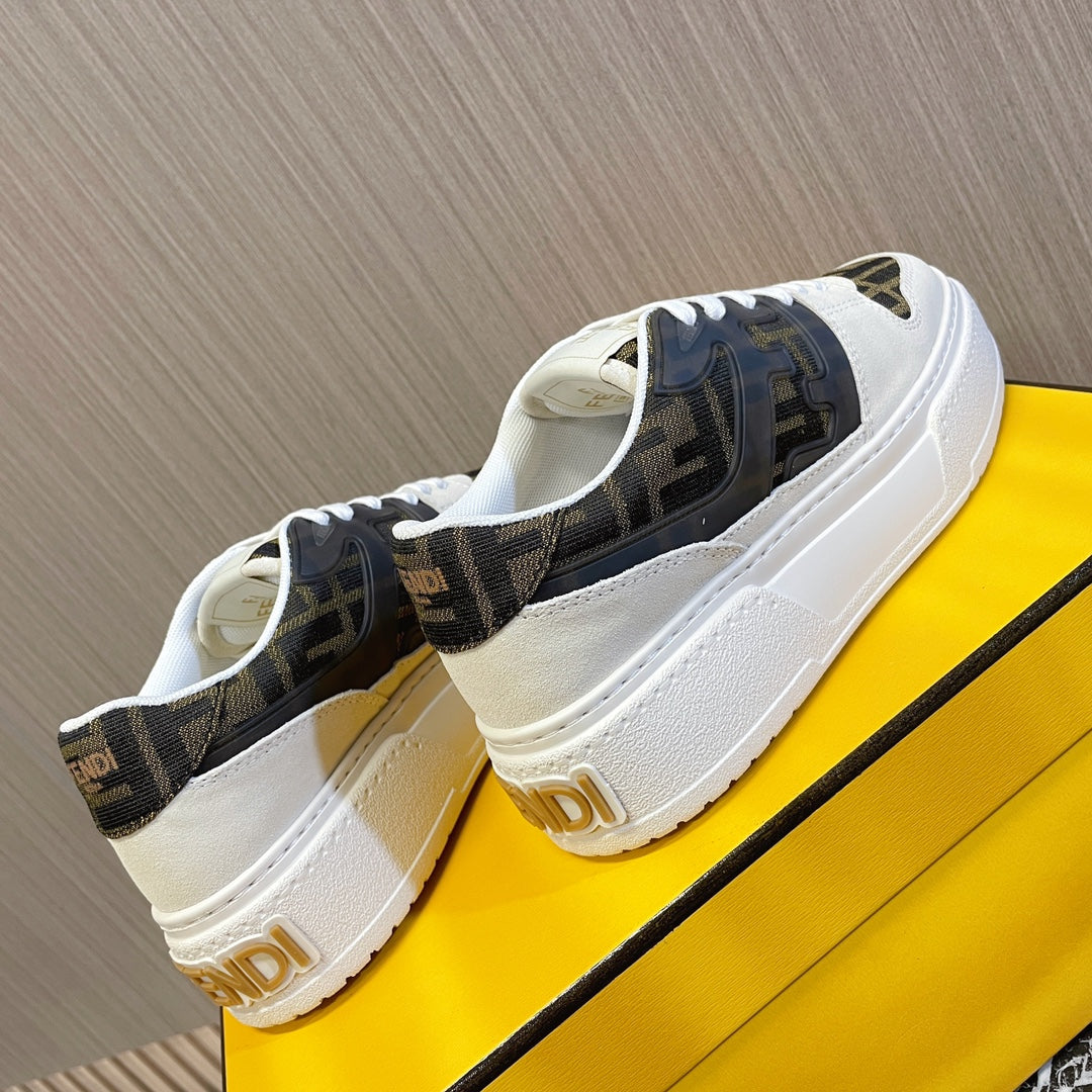 Fendi low-top sneakers with white laces and dark tan logo side panels