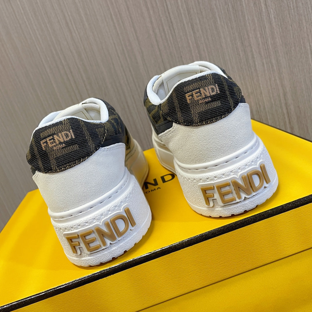 Back view of low-top sneakers with dark logo heel panels and white soles with FENDI text.