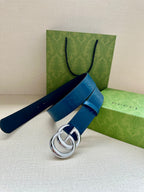 Blue leather belt with silver-tone GG buckle, single strap and buckle shown