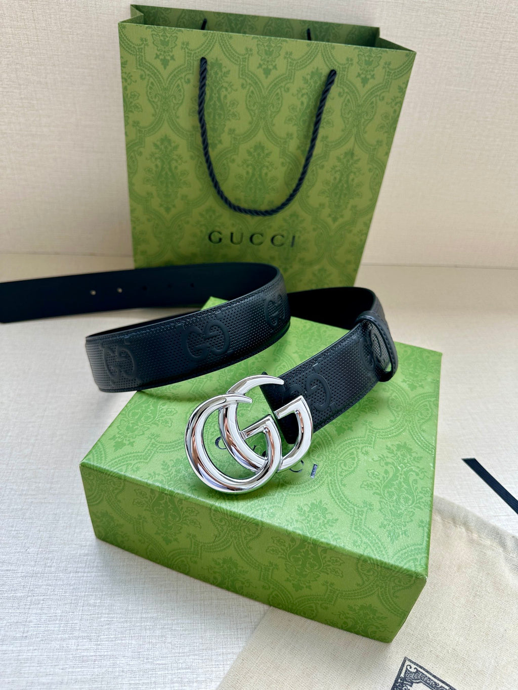 Gucci belt dark blue strap with silver double-G buckle and logo embossing