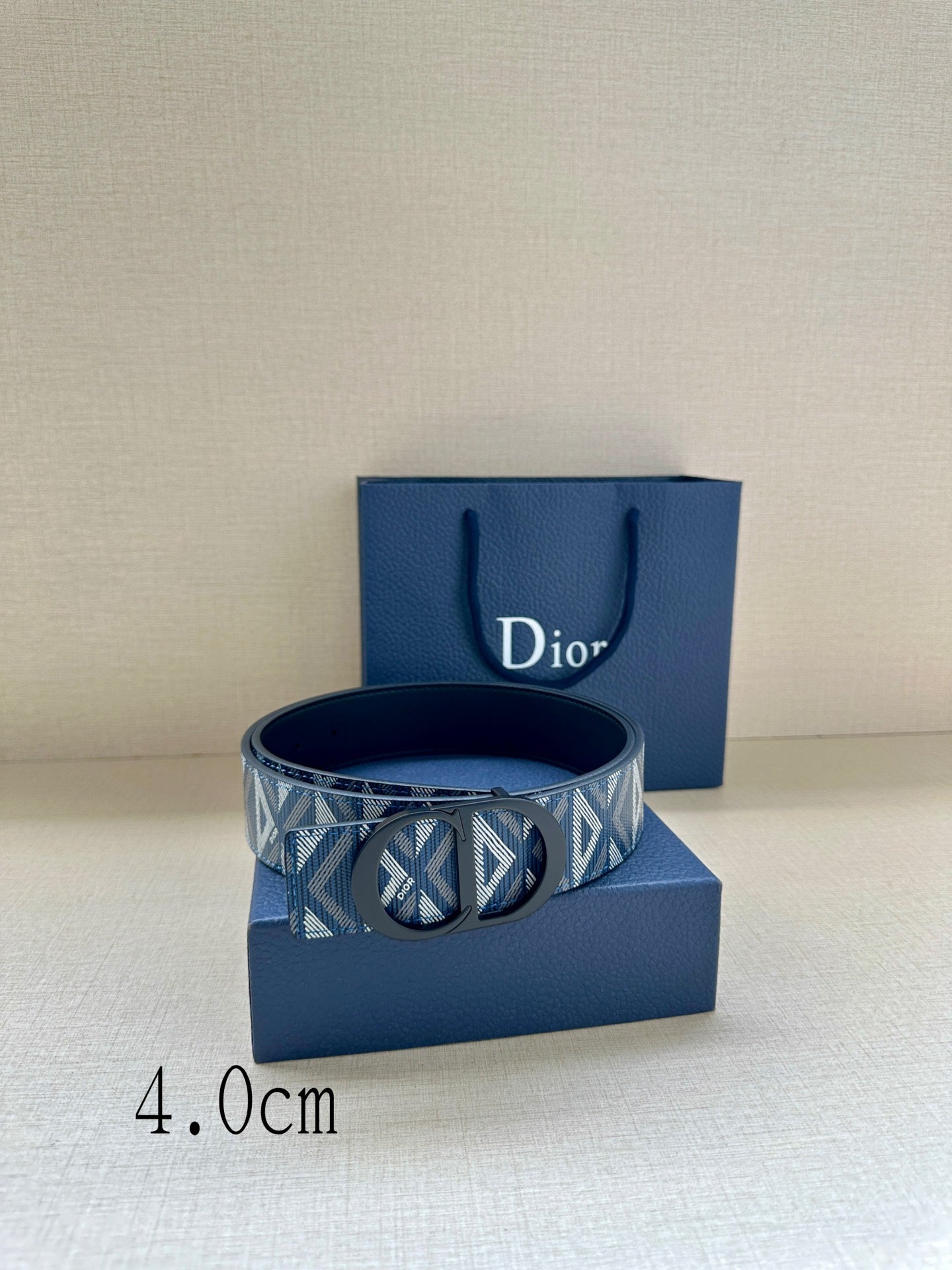Dior monogram belt, blue-and-white patterned strap with round black buckle
