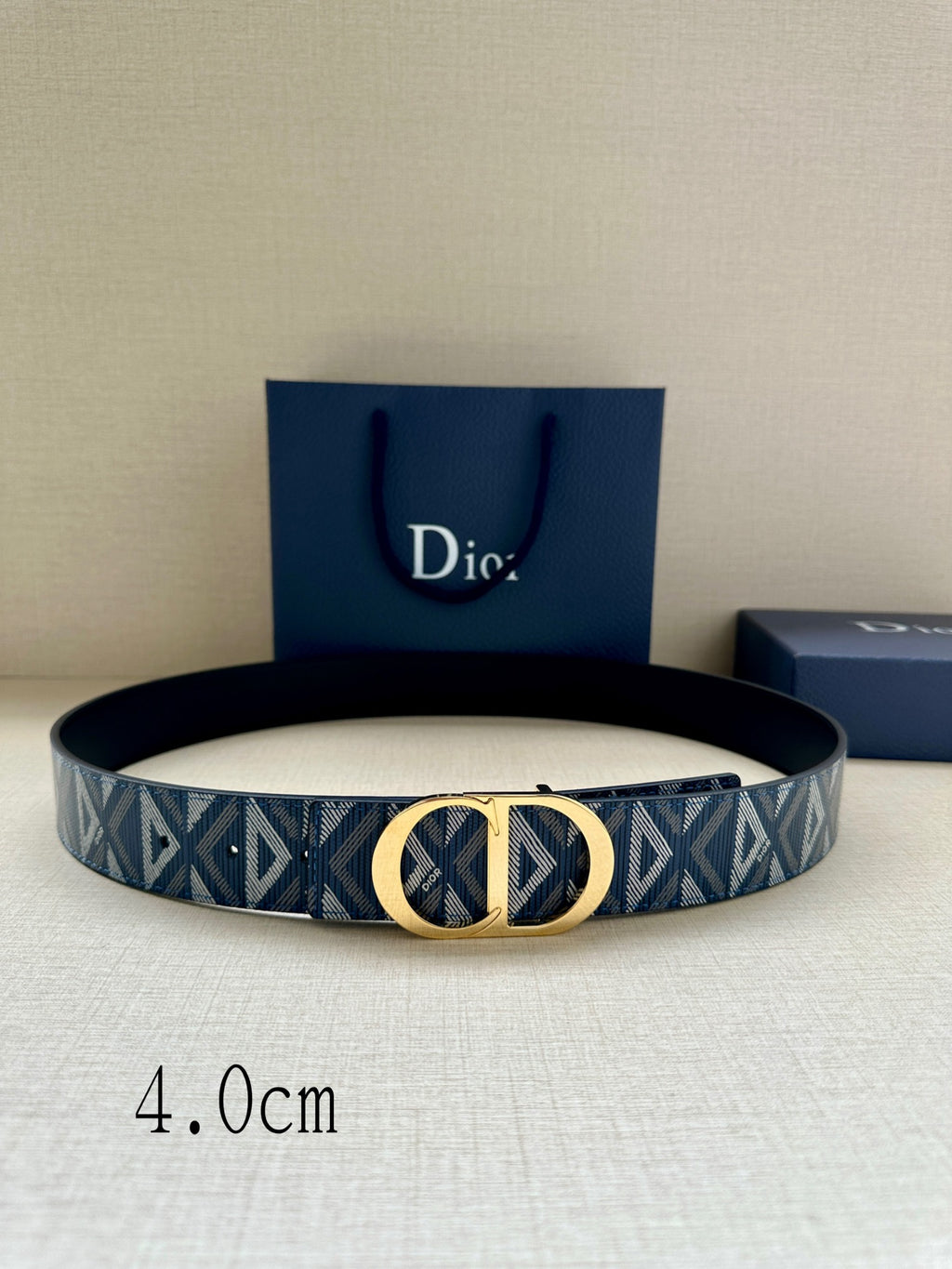 Dior belt with blue geometric jacquard strap and gold CD buckle