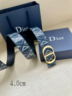 Dior belt with patterned blue strap and gold oval CD buckle