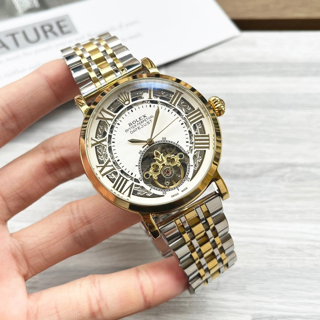 Rolex gold-tone wristwatch with open-heart dial and jubilee bracelet