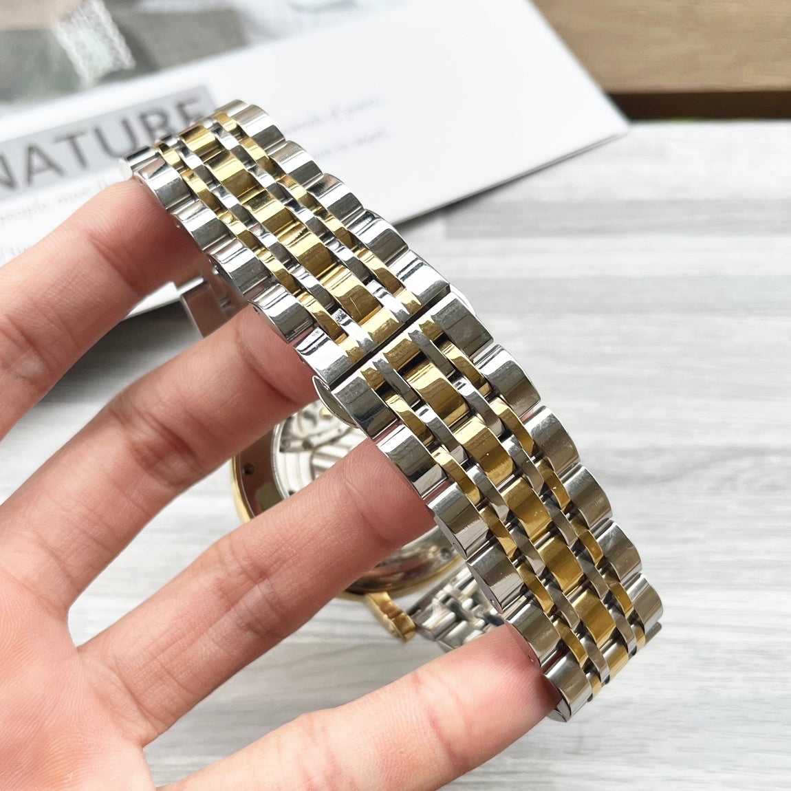 Rolex gold-and-silver watch bracelet with metal link design
