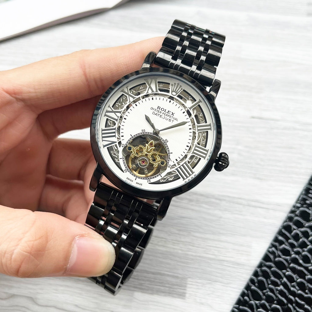 Rolex black wristwatch with skeleton dial and black metal bracelet