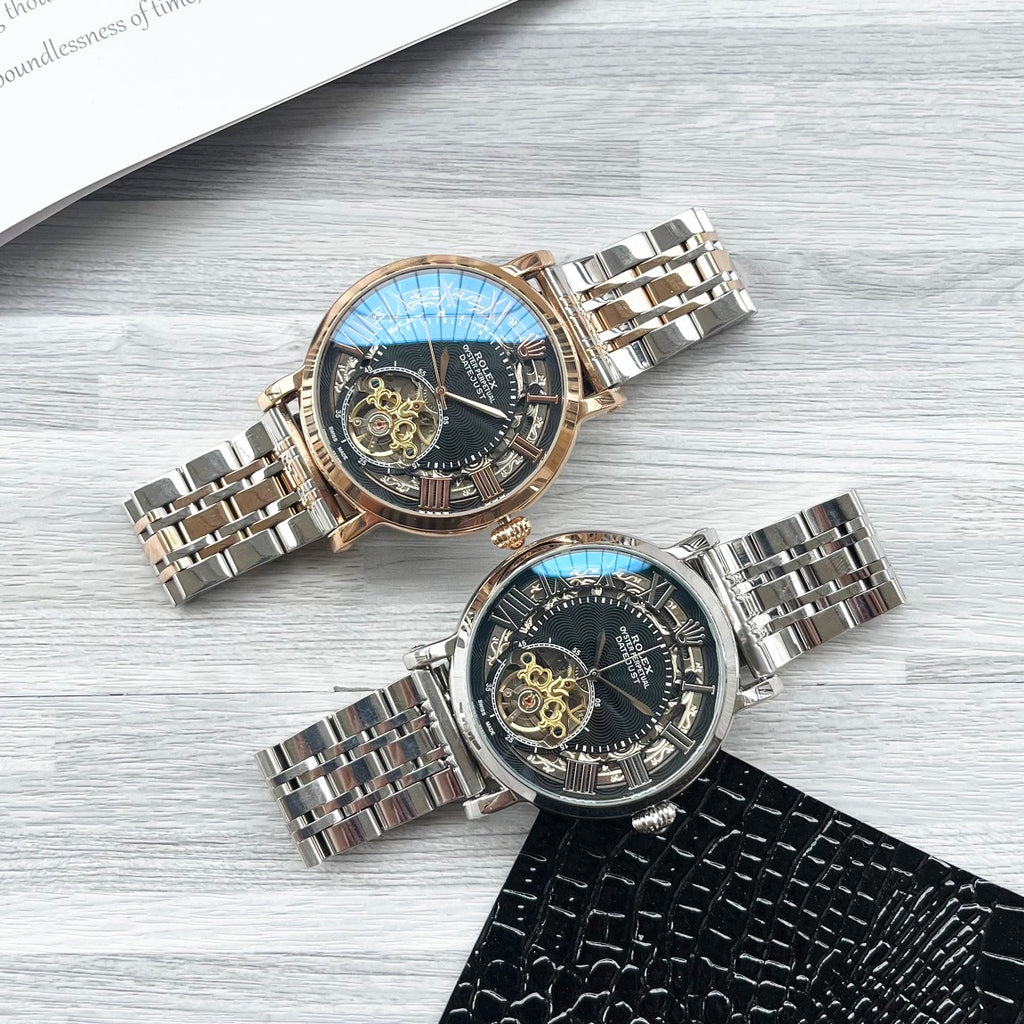 Rolex two wristwatches with blue dials, metal bracelets and one leather strap