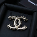 Chanel link chain bracelet with oval logo charm and metal clasp