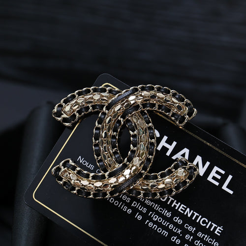 Chanel link chain bracelet with interlocking oval links, silver-tone and gold-tone