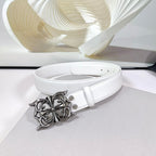 White leather belt with ornate silver-tone buckle and adjustable holes
