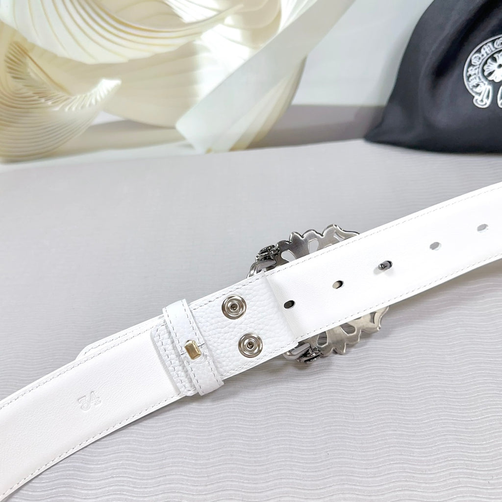 White leather belt clasp with metal snaps and detailed buckle hardware