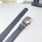 Chrome belt underside view: dark leather strap with adjustable holes and metal buckle.