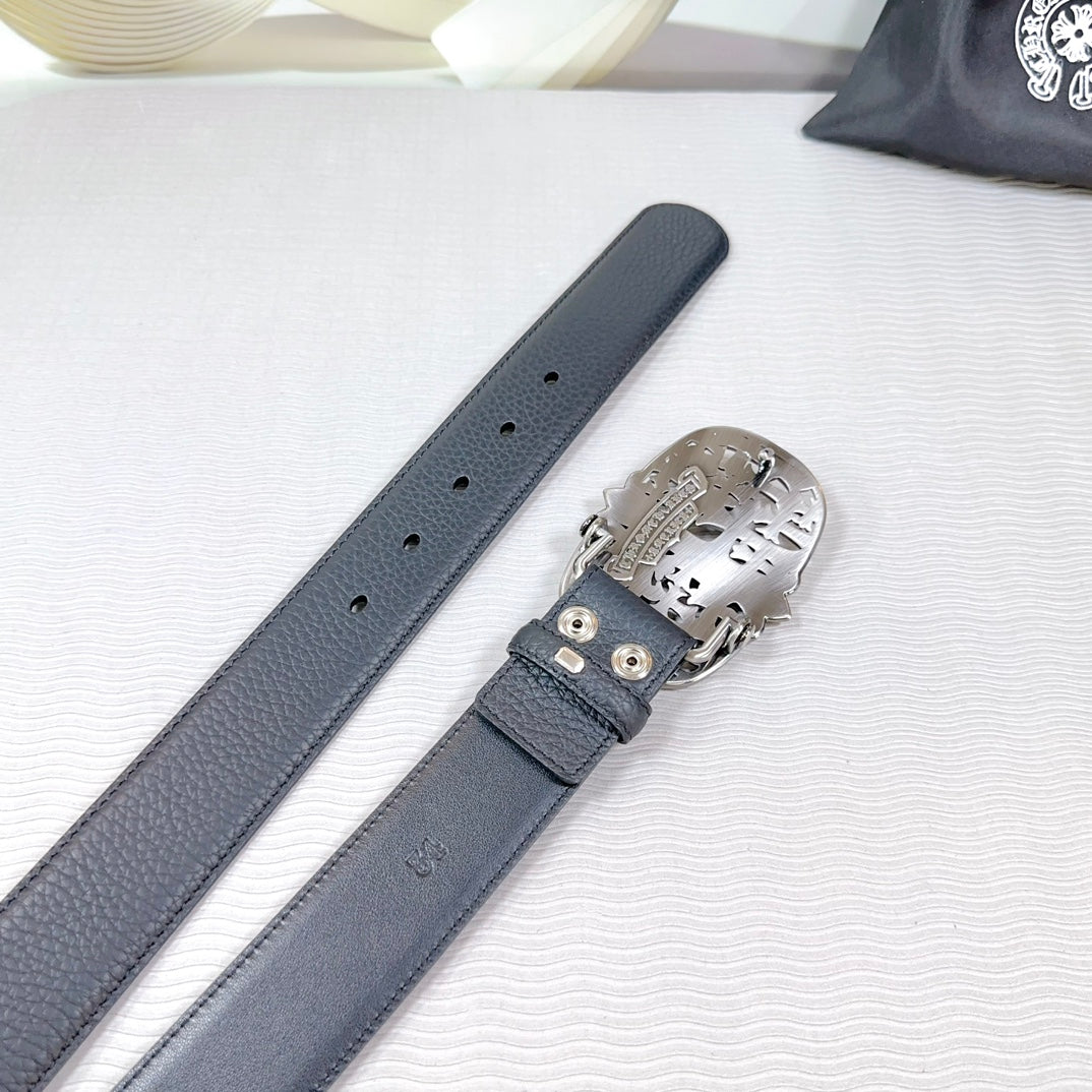 Chrome belt underside view: dark leather strap with adjustable holes and metal buckle.