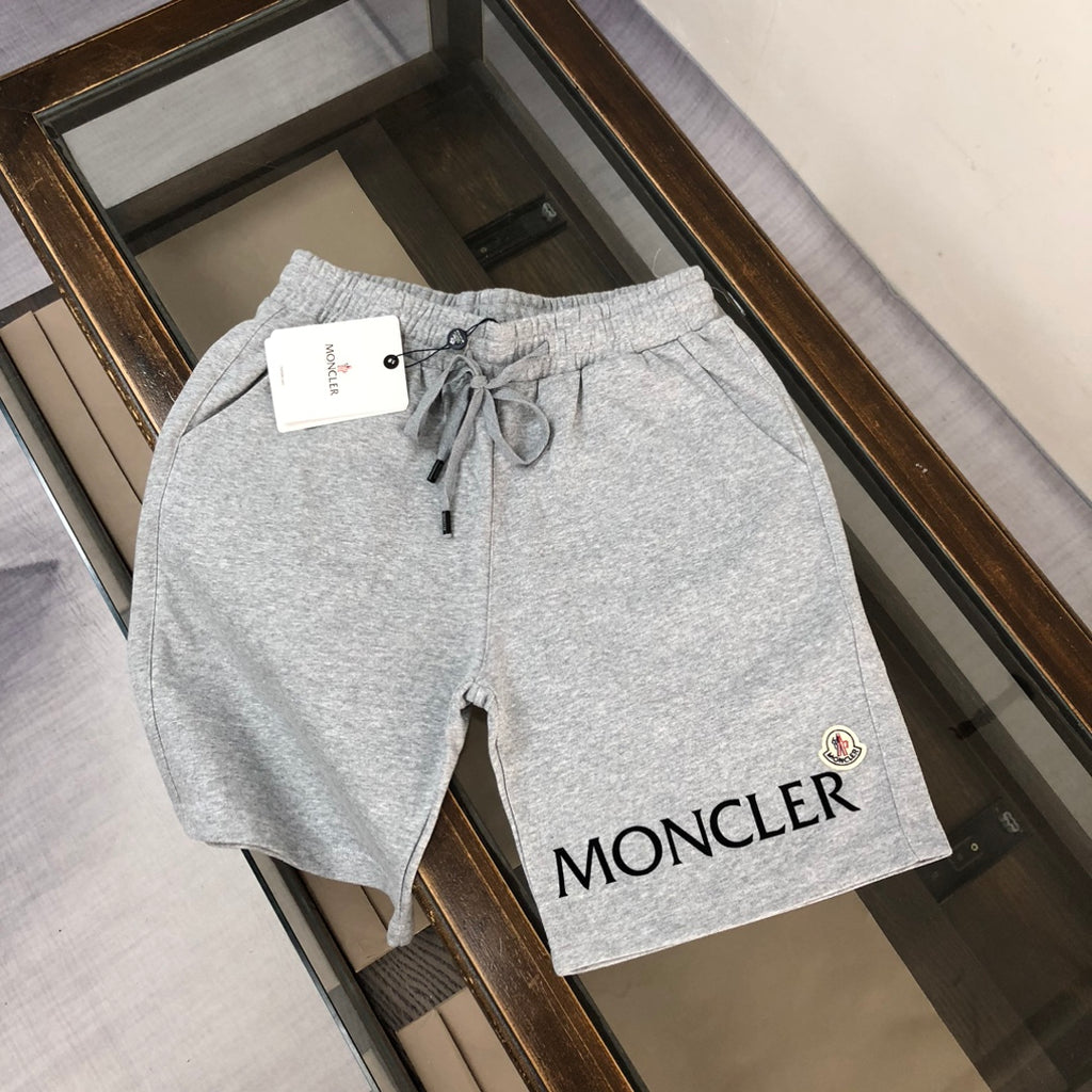 Heather gray drawstring shorts with elastic waistband and MONCLER logo patch