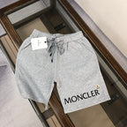 Heather gray drawstring shorts with elastic waistband and MONCLER logo patch