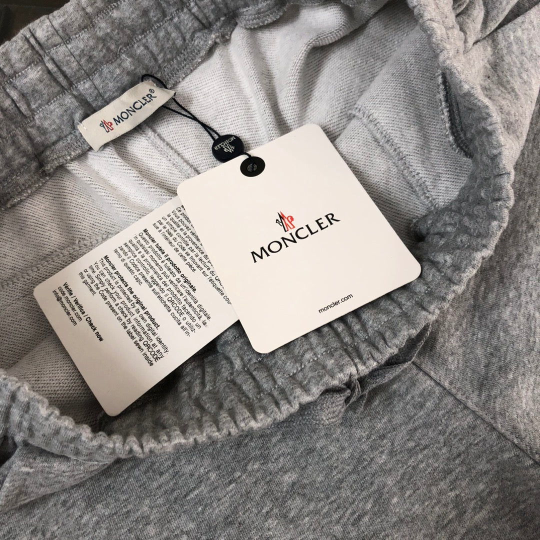 Heather gray drawstring shorts with attached hang tags and elastic waistband