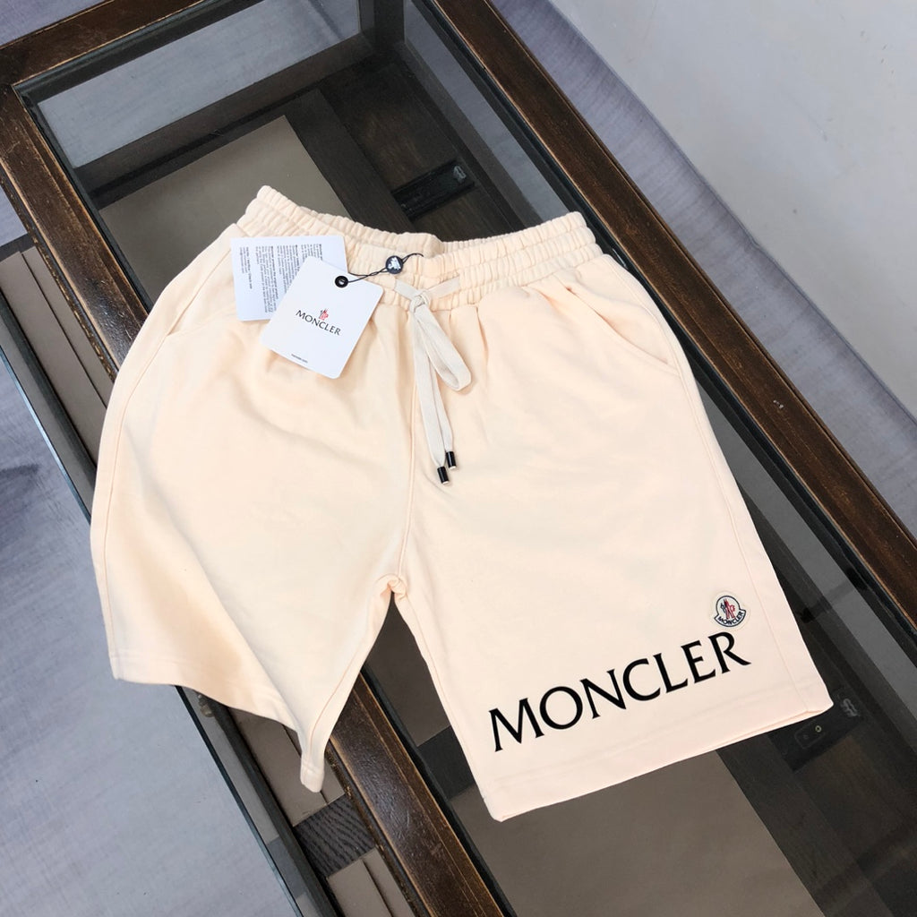 Cream drawstring shorts with MONCLER logo patch and black drawcord