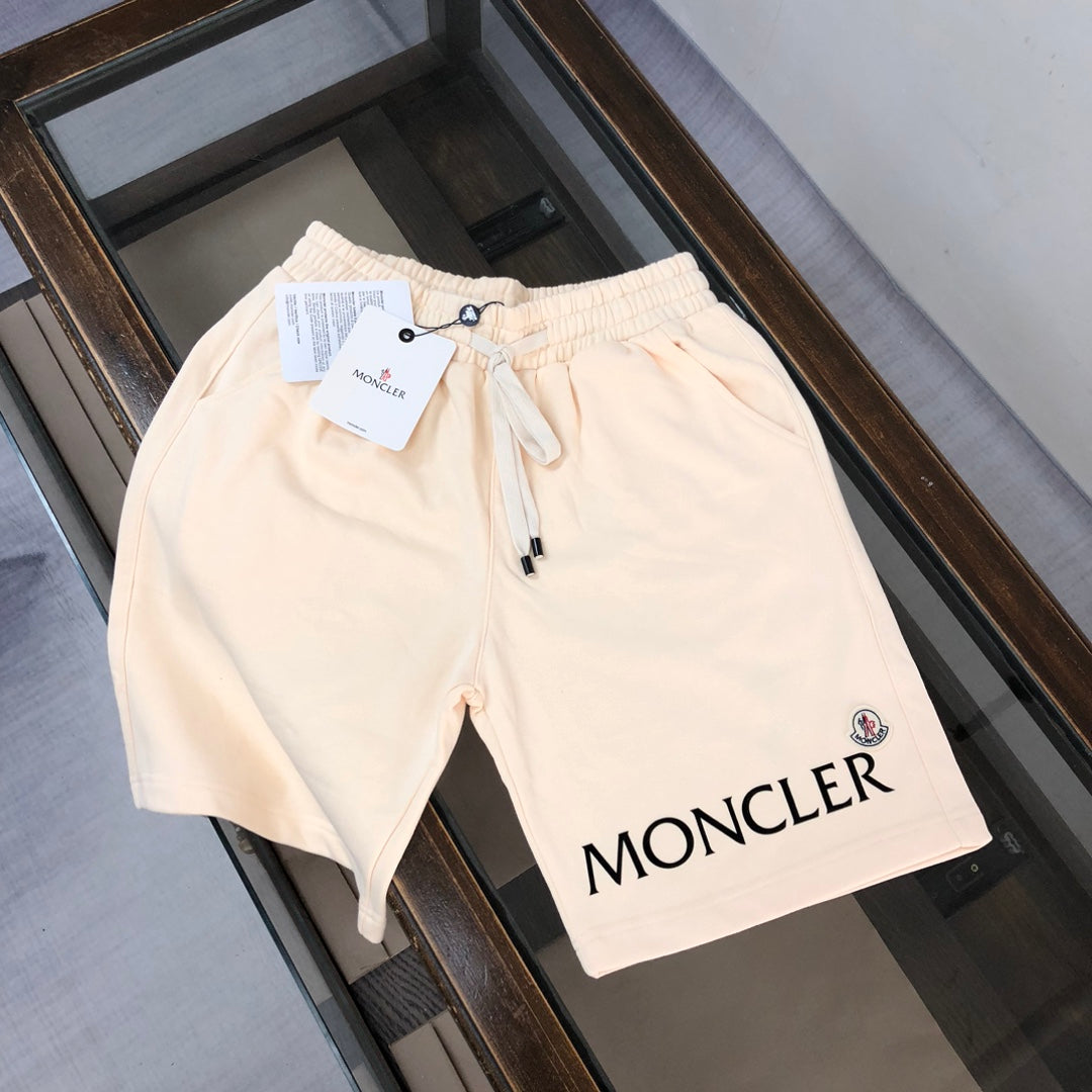 Cream drawstring shorts with MONCLER logo patch and black drawcord