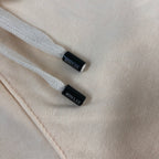 Cream shorts drawcord ends with MONCLER labels