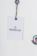 White crew-neck sweatshirt with logo patch and hanging brand tag