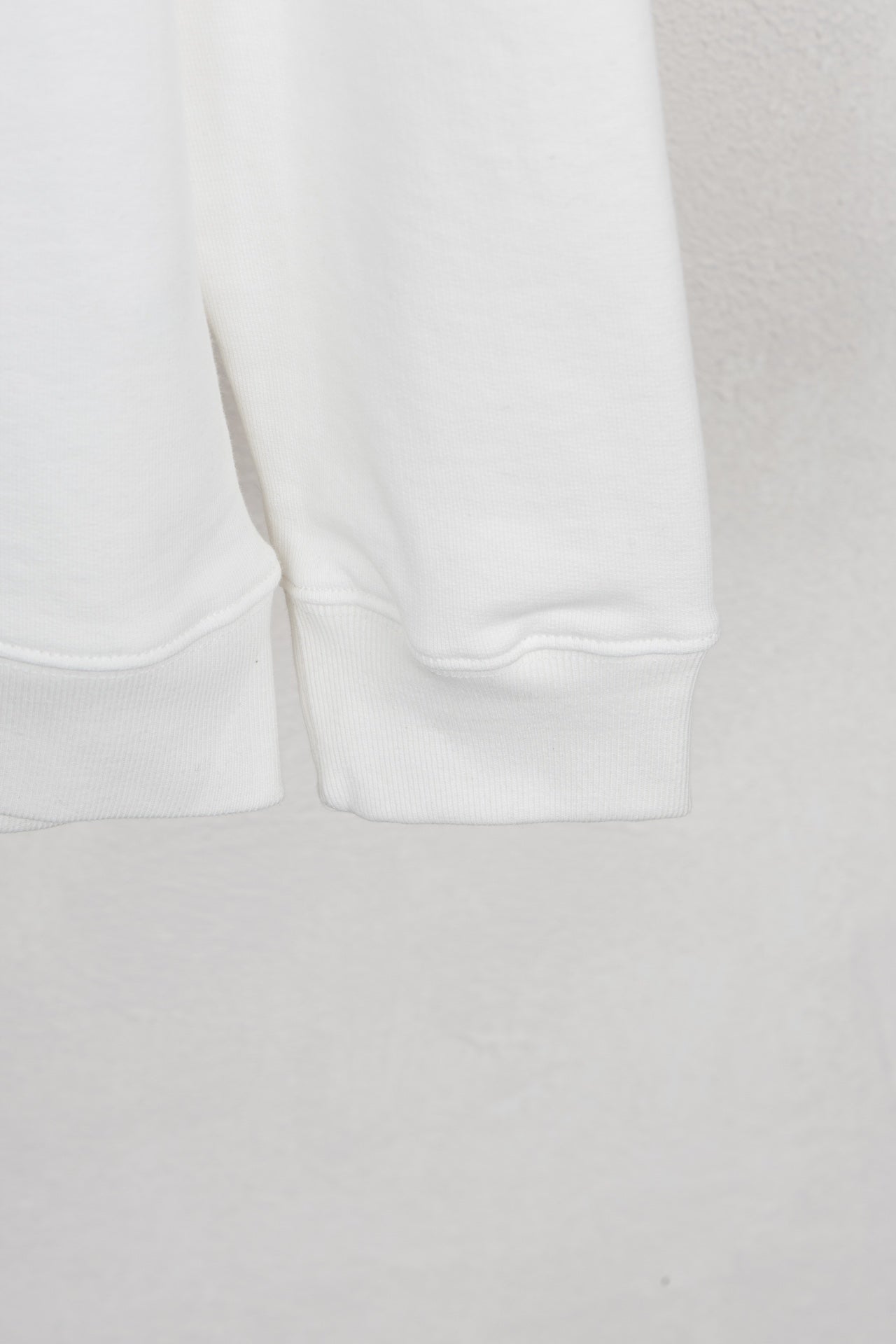 White sweatshirt cuff with ribbed hem