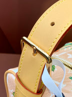 Louis Vuitton mini crossbody bag strap, gold buckle and stitching on yellow leather.