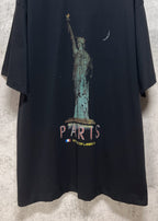 Dark T-shirt front with Statue of Liberty and “PARIS” text print