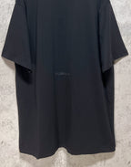 Dark T-shirt back view with small Balenciaga logo centered