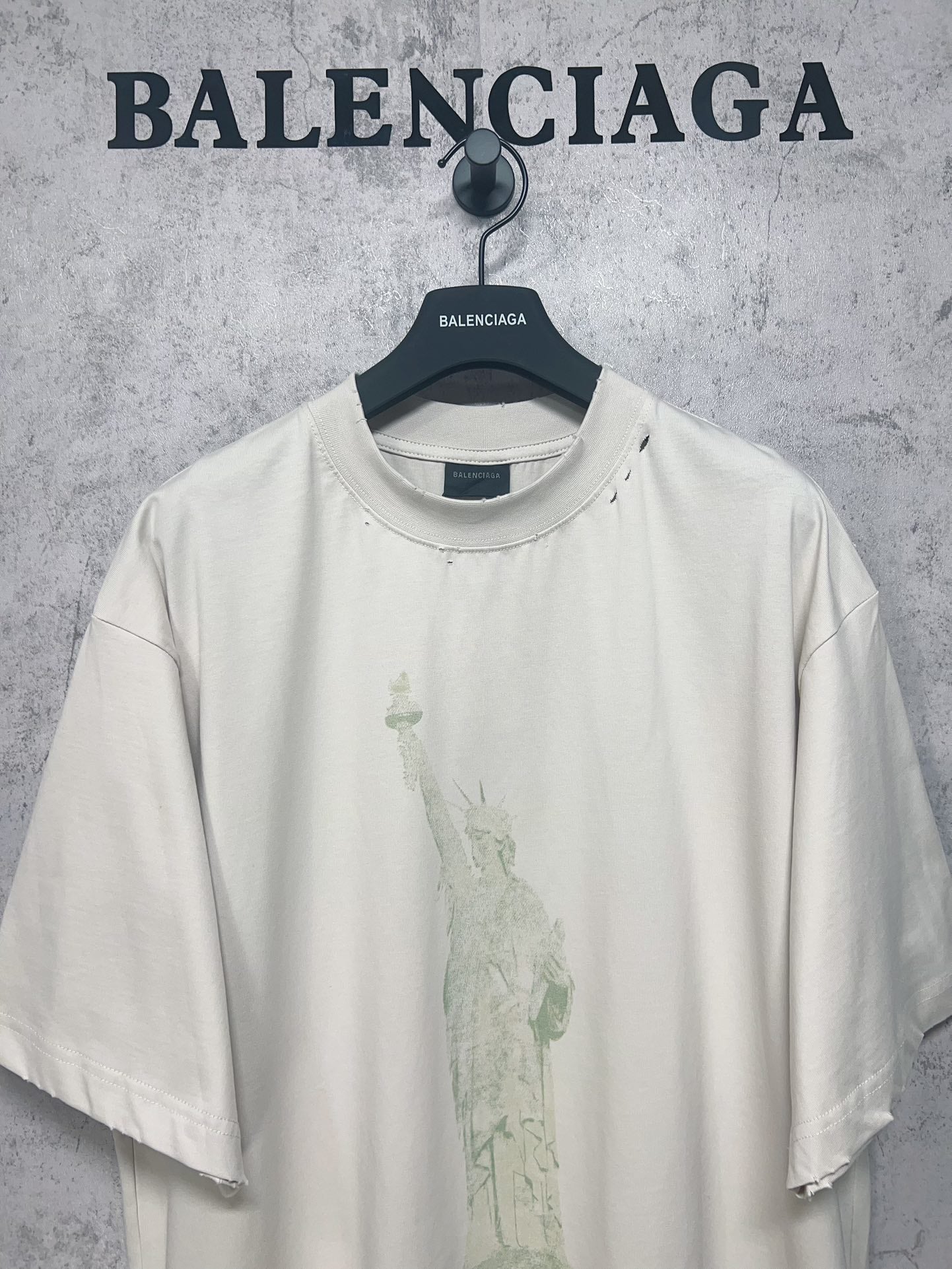 White short-sleeve T-shirt with Statue of Liberty graphic on chest