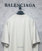 White short-sleeve T-shirt back with Balenciaga logo print near the hem