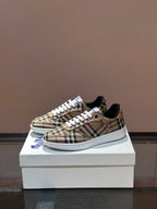 Side view checkered low-top sneakers with white laces and blue sole edge