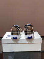 Back view checkered sneakers with black lining, white laces, blue heel strip