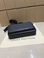 Louis Vuitton monogram crossbody bag, black, top view with front flap and zip