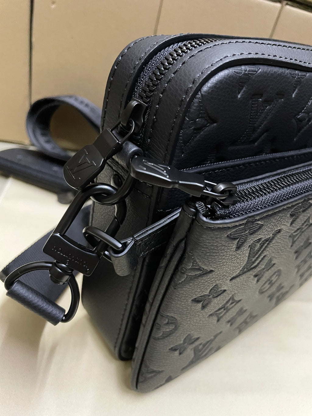 Louis Vuitton monogram crossbody bag, black, zipper pull and D-ring strap attachment