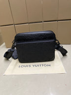 Men's Louis Vuitton crossbody bag, dark blue monogram, top zip closure and shoulder strap