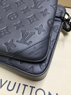 Louis Vuitton monogram leather corner, textured black, zipper edge and ring detail