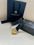 Navy patterned belt with gold Medusa buckle and strap ends