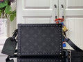 Men's Louis Vuitton bag with black monogram canvas, studded trim and crossbody strap