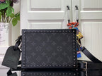 Louis Vuitton monogram bag, dark gray with studded edges and top handle